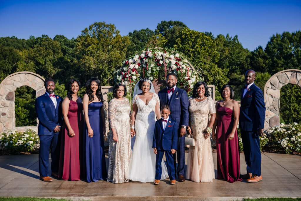 bride and groom with bridal party at tuscan ridge